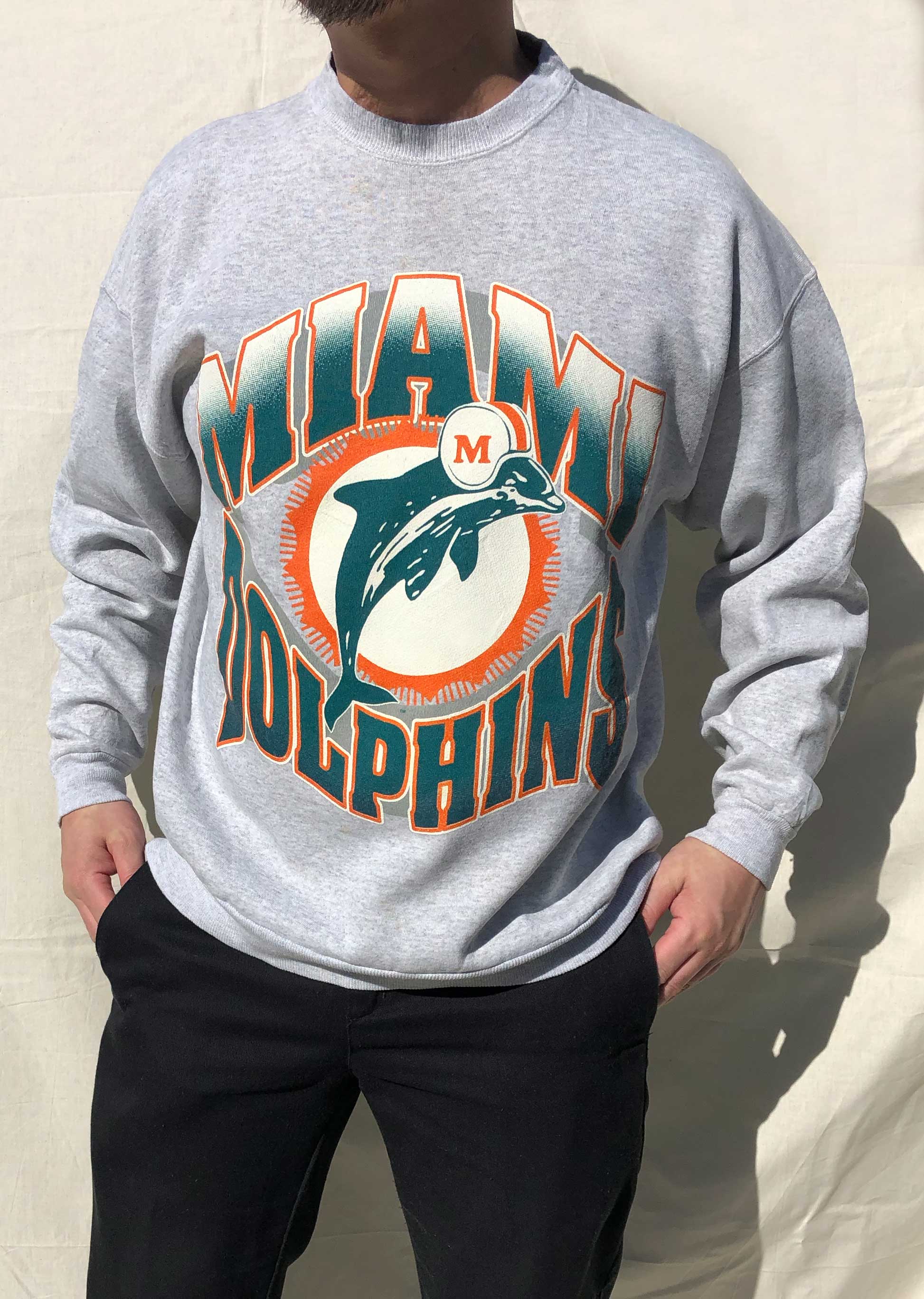 Dolphins sweater store